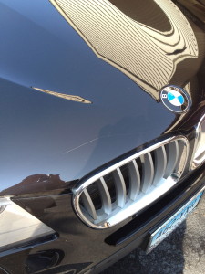 A deep scratch to the hood of this BMW was a good candidate for this service.